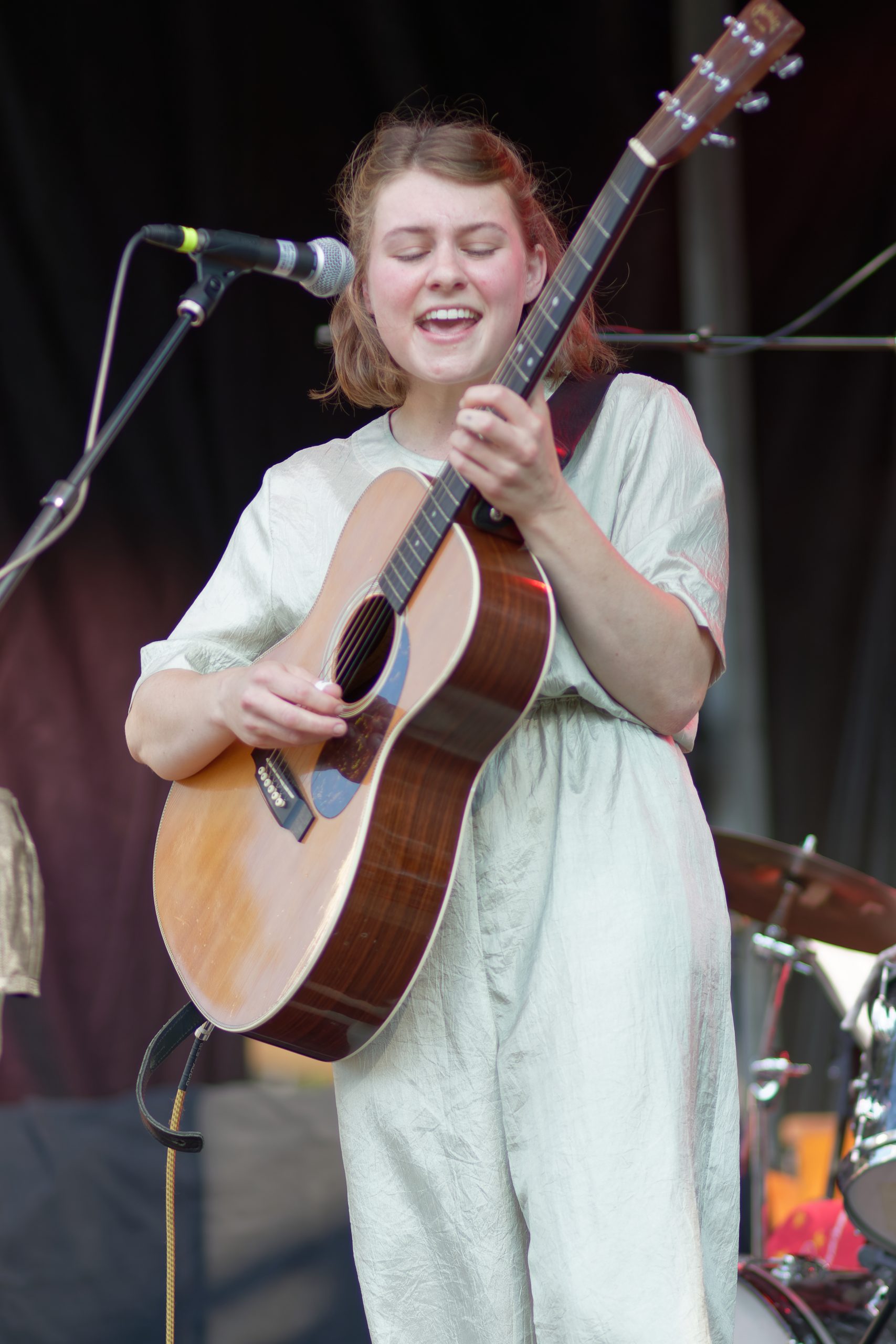 Kate Rhudy performing at the Moore Square venue
Photo by Ford Bowles